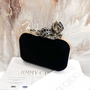 Jimmy Choo Black Velvet Crystal Flower Embellished Mini Cloud Clutch